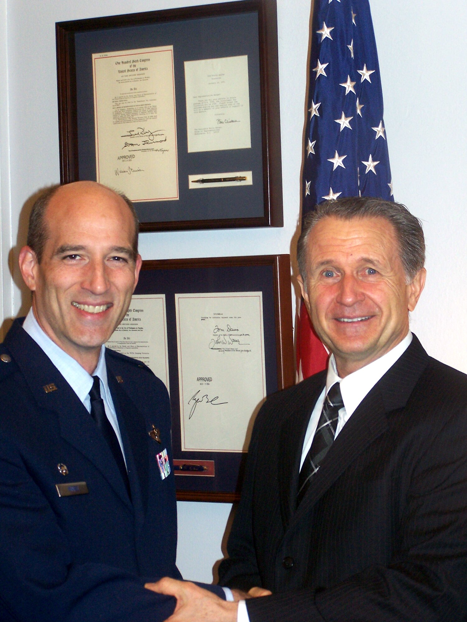 Air Force Reservist Col. Jeffrey T. Mineo, 940th Air Refueling Wing commander, visits with California District 2 Congressman Wally Herger. The colonel was visiting Washington, D.C. for the annual Headquarters Air Force Reserve Wing Commander's Orientation Course. The course, conducted at the Pentagon, is designed to give a better understanding of the congressional and military processes by covering a variety of subject matter specific to the Air Force Reserve and Department of Defense. Topics included legislative update, Congressional issues, Unified Legislative Budgeting process, Military Construction, Programs and Requirements, Air and Space Operations, Medical and Personnel updates, Strategic Communication and more. Col. Mineo also toured the Pentagon and Capitol building, and was able to sit in on House and Senate hearings in progress. (Photo courtesy of Mr. Darin Thacker, Legislative Director and Military Liaison to Congressman Wally Herger).