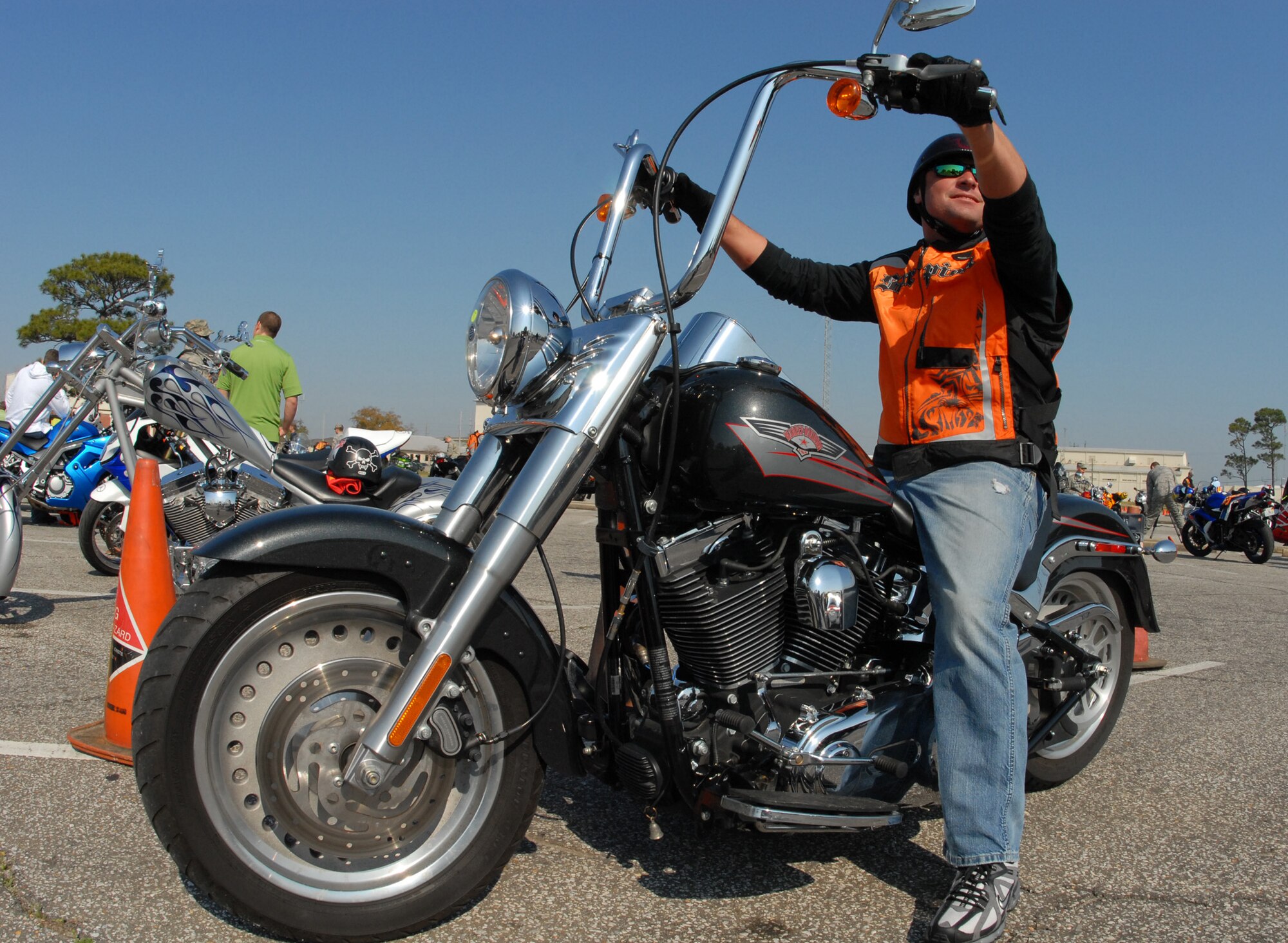 Brandon Ricketts, 46th Aircraft Maintenance Squadron, revs up his bike as we waits for the rest of his group during the Team Eglin Motorcycle Safety Day March 13 at Eglin Air Force Base, Fla. The second annual event brought out approximately 280 riders to participate in safety discussions, riding skills competition and group ride. (Air Force Photo/Samuel King Jr.)