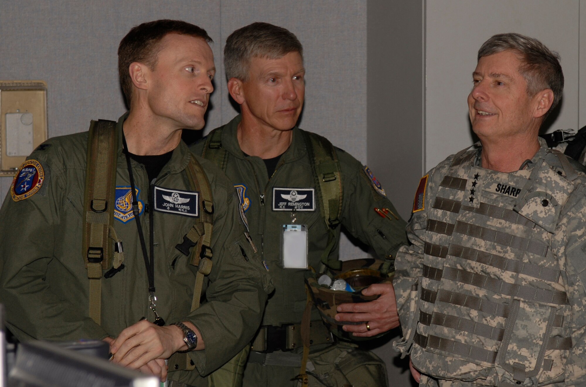 OSAN AIR BASE, Republic of Korea --  (Left to right) Col. John Harris, chief
of the 607th Combat Operations Division, briefs Lt. Gen. Jeffrey Remington,
the 7th Air Force commander, and Gen. Walter Sharp, the U.S. Forces Korea
commander, on exercise operations in the Hardened Tactical Air Control
Center here. General Sharp visited Osan to review Air Component Command’s
role in the Key Resolve/Foal Eagle 09 exercise. KR/FE, like all Combined
Forces Command (CFC) exercises, is a routine training exercise,
defense-oriented and designed to enhance readiness and the ability of the
Republic of Korea-U.S. Alliance to defend the ROK against external
aggression. It is not tied in any way to any political or real-world event.
(U.S. Air Force photo by Staff Sgt. Benjamin Rojek)
