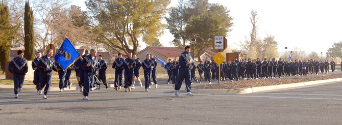 Maj. Gen. David Eichhorn, Air Force Flight Test Center commander, leads Edwards Airmen during an installation formation run. More than 700 Airmen participated in the event. (U.S. Air Force photo/Senior Airman Julius Delos Reyes)