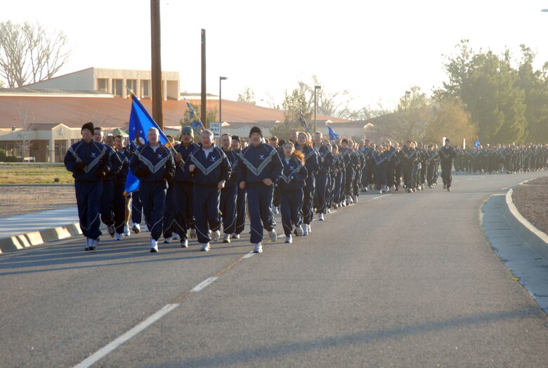 Maj. Gen. David Eichhorn, Air Force Flight Test Center commander, leads Edwards Airmen during an installation formation run. More than 700 Airmen participated in the event. (U.S. Air Force photo/Senior Airman Julius Delos Reyes)