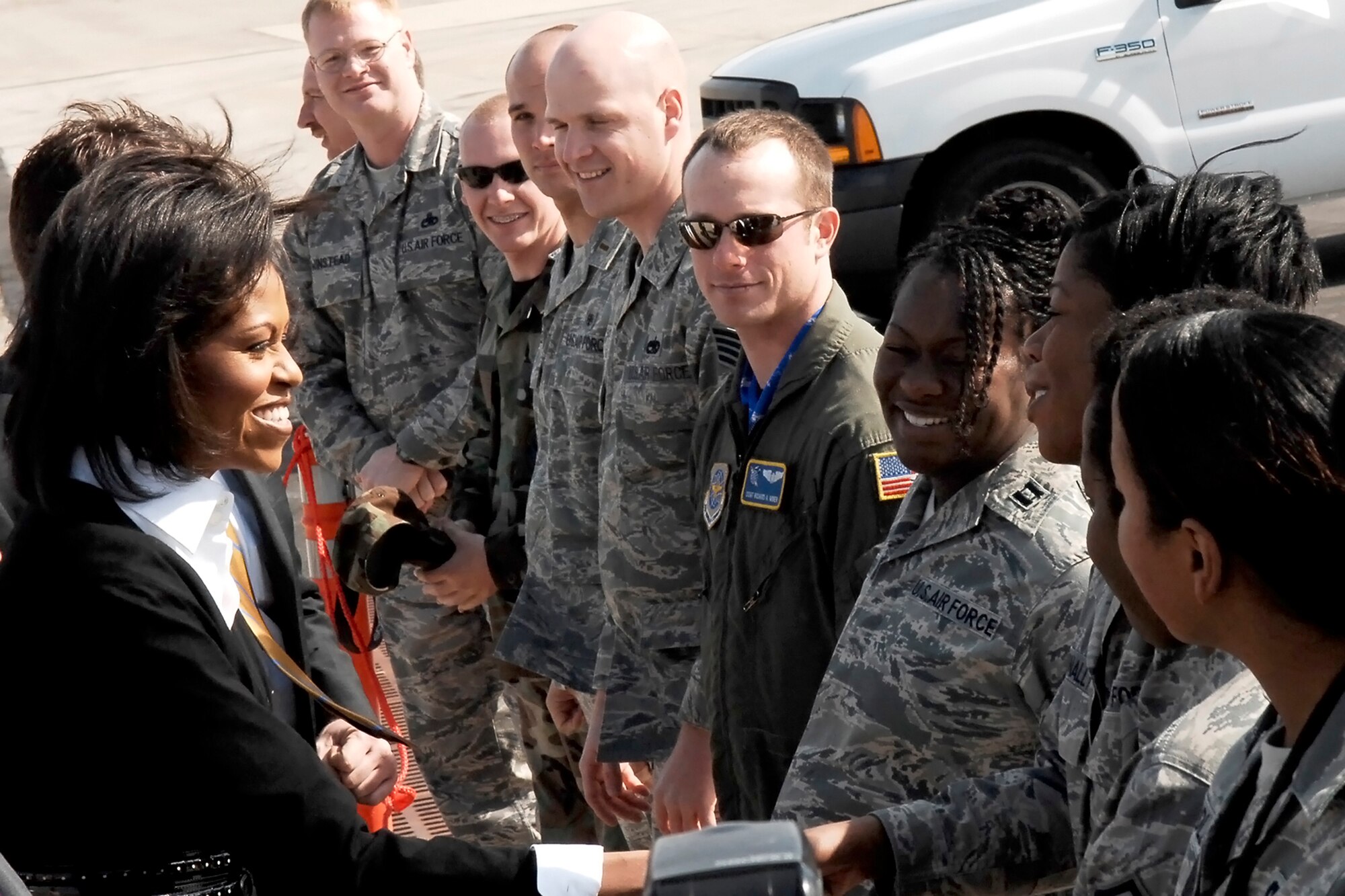 Michelle Obama, First Lady of the United States, speaks with Pope Air Force Base Airmen after arriving at Pope March 12. The First Lady spent her day visiting Fort Bragg and the downtown Fayetteville community, thanking the military families of the greater Fayetteville area for their support.