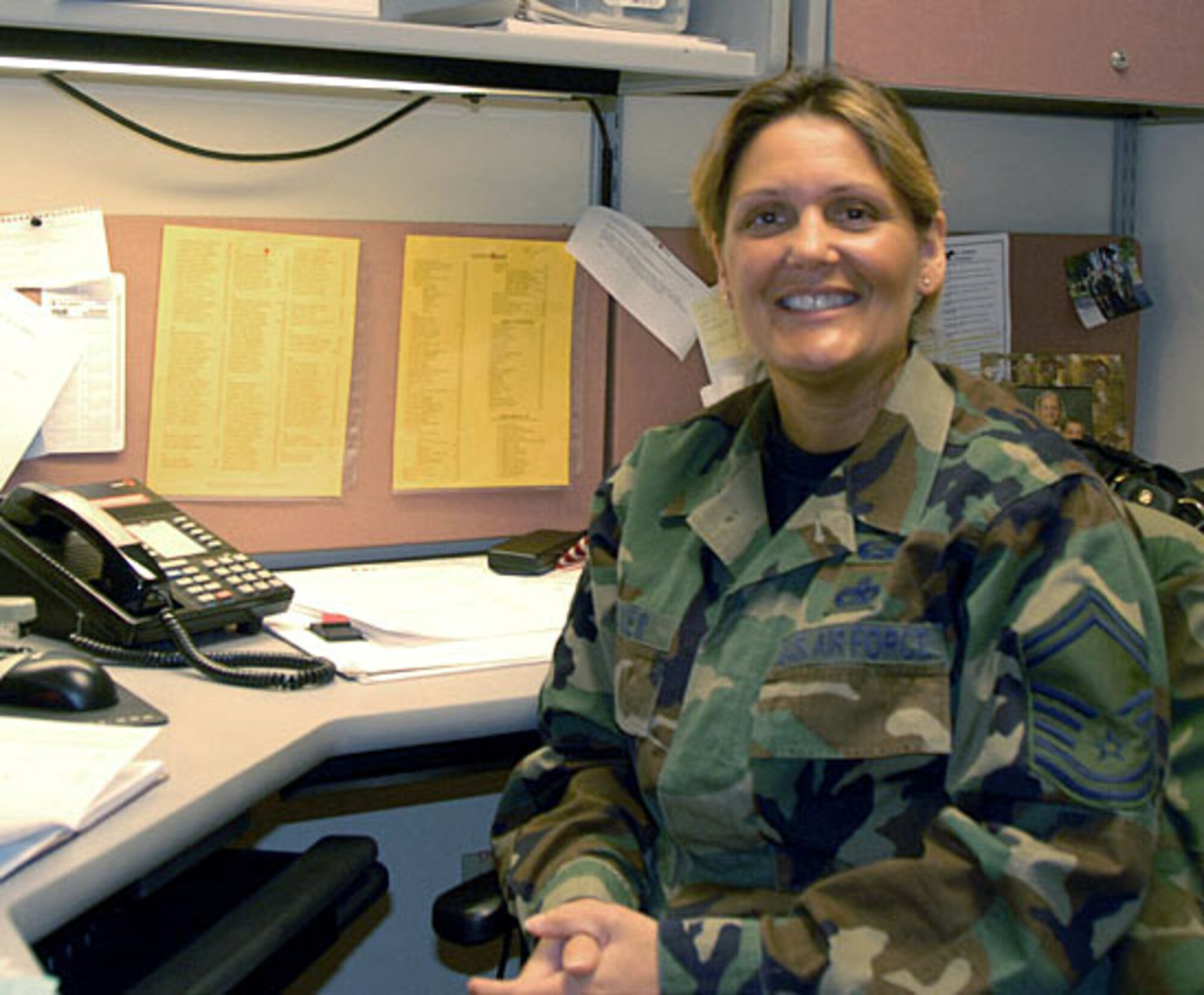 Senior Master Sgt. Jo-Ann Decker, the superintendent for the 128 Air Refueling Wing’s Judge Advocate General’s office, prepares for her January drill at the General Mitchell Air National Guard Base in Milwaukee, WI.  Decker recently accepted the positions of senior paralegal for JAG's Legal Information Systems and the ANG's officer liaison to JAG's Legal Information Systems.