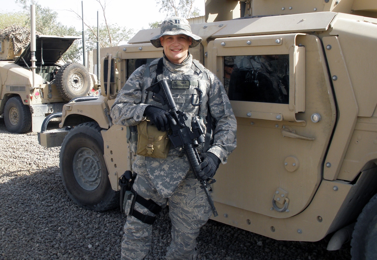 Capt. Michael Aamold, AETC Security Forces chief of current operations, pauses before a mission while deployed to Iraq. Captain Aamold earned the 2008 Outstanding Security Forces Higher Headquarters Company Grade Officer Award. (U.S. Air Force photo by Steve White)