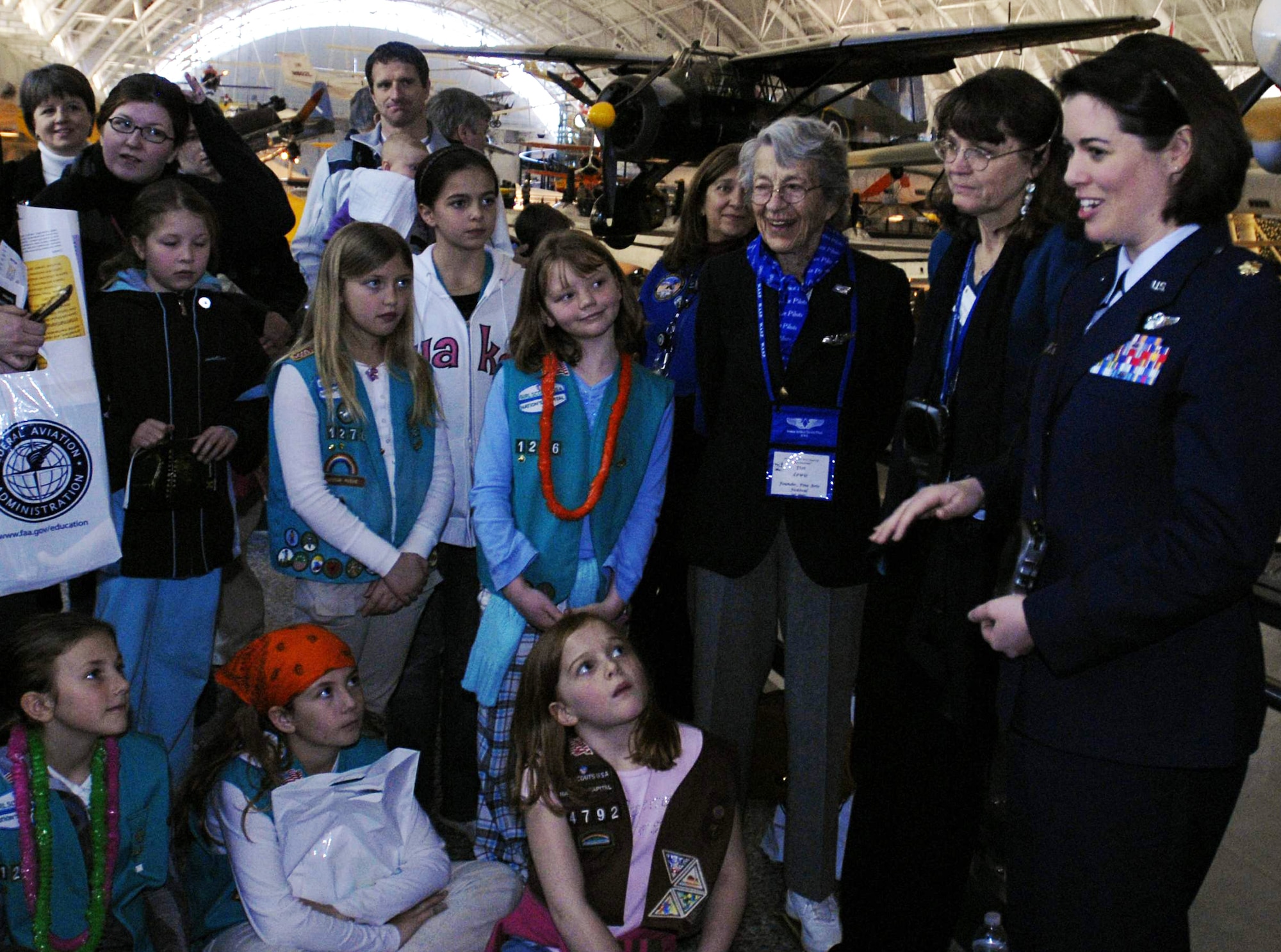 Maj. Nicole Malachowski answers questions at the Women in Aviation and Space Family Day March 14 at the National Air and Space Museum's Hazy Center in Chantilly, Va. The event featured female air and space pioneers, including astronauts, a World War II Women Airforce Service Pilot and several aerospace experts at exhibit booths where visitors could learn hands-on about science and flying. Major Malachowski was the first female Thunderbirds pilot. (U.S. Air Force photo/Staff Sgt. J.G. Buzanowski) 
