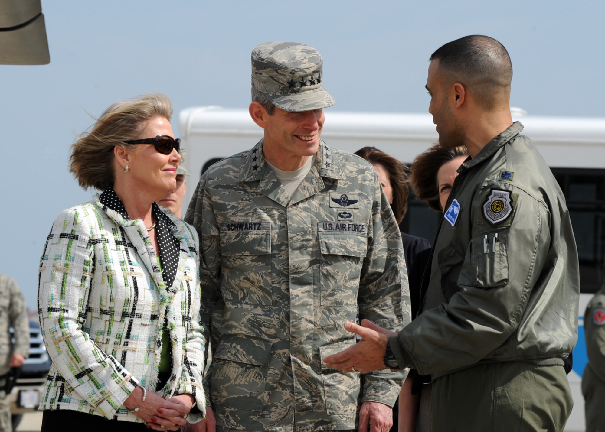 LANGLEY AIR FORCE BASE, Va. -- Gen. Norton Schwartz, former Chief of Staff of the Air Force, and Mrs. Suzie Schwartz are briefed by Lt. Col. Adrian Spain, 94th Fighter Squadron commander, on the capabilities of the F-22A Raptor March 11. General Schwartz reviewed Langley’s war fighting capabilities, viewed an F-22A demonstration, and held an Airmen's Call, and Mrs. Schwartz visited the Airmen and Family Readiness Center. (U.S. Air Force photo/Airman 1st Class Jonathan Koob)