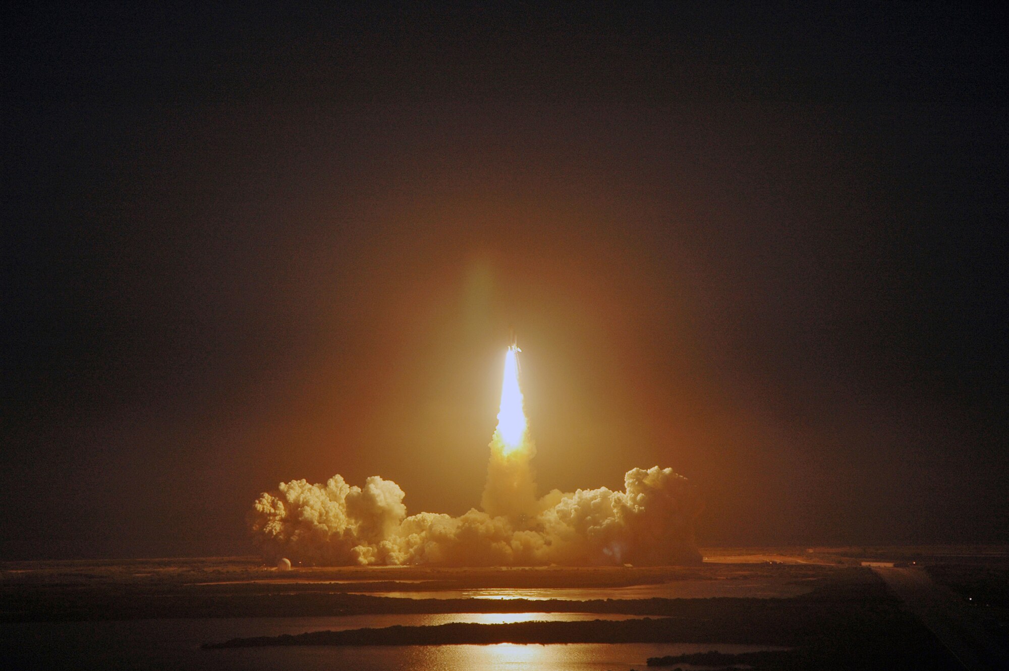 KENNEDY SPACE CENTER, Fla. -- Space Shuttle Discovery rides a tower of flame as it roars into space on the STS-119 mission March 15. At exactly 7:43 p.m., the shuttle's massive engines erupted in a tower of flame, sending Discovery on its way to the International Space Station, where it will deliver a final pair of power-generating, solar-array wings and a truss segment. The 920th Rescue Wing provides first-response emergency medical and search-and-rescue support for every NASA shuttle and rocket launch. (Courtesy photo NASA/Marino Jeffrey)