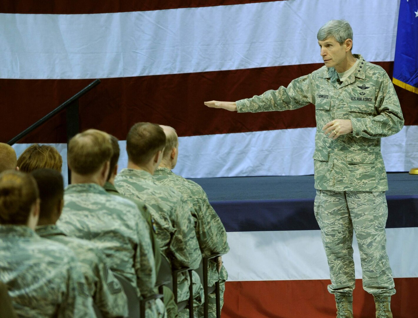 General Norton Schwartz speaks to Airmen during an Airmen's Call March 11 at Langley Air Force Base, Va. General Schwartz, the Air Force chief of staff, reviewed Langley AFB's warfighting capabilities and viewed an F-22 Raptor demonstration during his visit. (U.S. Air Force photo/Senior Airman Scott Aldridge) 
