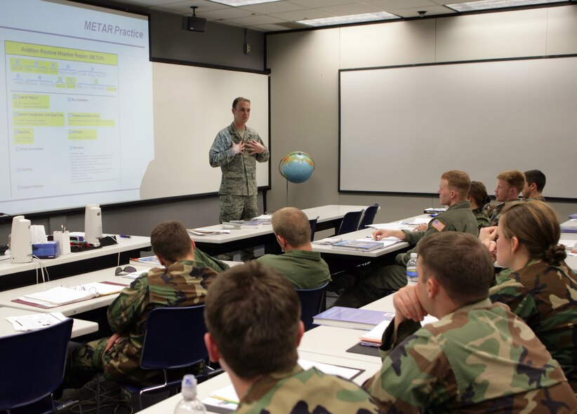AIR FORCE ACADEMY, Colo. -- Capt. Paul Homan, instructor of meteorology at the Academy, discusses Meteorological Aviation Reports with a class of cadets here recently. Capt. Homan is a member of the Academy’s meteorology faculty, which includes four officers, one non-commissioned officer and one civilian. (Photo by Ryan Hansen)