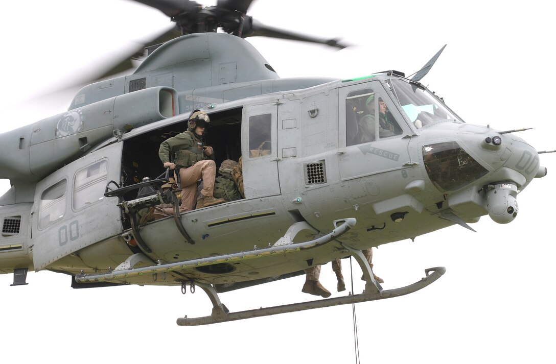 U.S. Marines practice rappelling and spy rigging out of a UH1-Y Huey helicopter on Camp Pendleton, Calif., March 11, 2009.