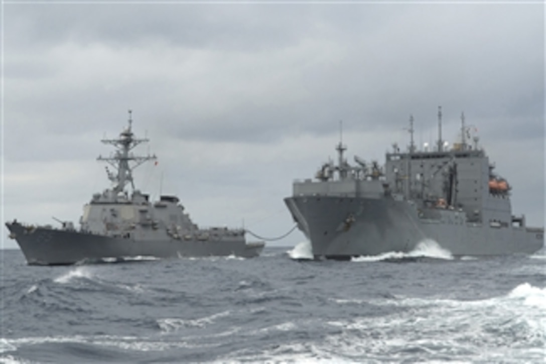 The guided-missile destroyer USS McCampbell (DDG 85) conducts an underway replenishment at sea with the Military Sealift Command ship USNS Alan Shepard (T-AKE 3) in the Pacific Ocean on March 4, 2009.  The McCampbell is one of seven Arleigh Burke-class destroyers assigned to Destroyer Squadron 15 and is permanently forward deployed to Yokosuka, Japan.  