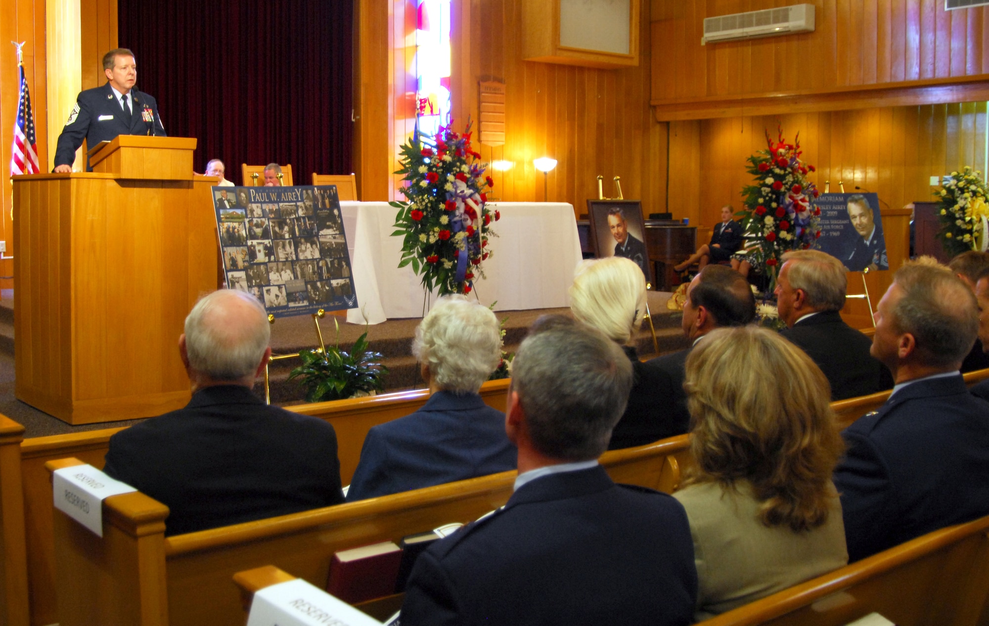 Chief Master Sgt. of the Air Force Rodney McKinley addresses those in attendance for the memorial service of the first Chief Master Sgt. of the Air Force, Paul W. Airey, at theTyndall Air Force Base Chapel March 16. Chief McKinley spoke of Chief Airey's legacy and how that legacy affects the decisions he makes for today's Air Force. "Chief Airey is the most respected Airman in the history of the Air Force," he said. (U.S. Air Force photo/Lisa Norman)