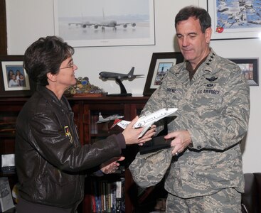 Col. Jacqueline Van Ovost, 12th Flying Training Wing commander, presents Gen. Stephen Lorenz, Air Education and Training Command commander, with a model T-1 Jayhawk aircraft during his visit last week. General Lorenz visited the wing March 12-13 to learn about the mission and people who both work for and support the needs of the major command. (U.S. Air Force photo by Joel Martinez)