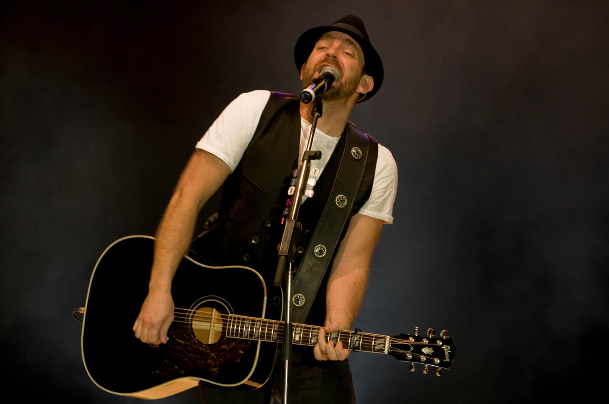 Kristian Bush, Sugarland's guitarist/vocalist, performs during a special concert March 14, 2008, Ramstein Air Base, Germany. Armed Forces, Army and Navy Entertainment groups, hosted the European tour to military bases in Italy, Germany and the Netherlands. (U.S. Air Force photo by Senior Airman Nathan Lipscomb)