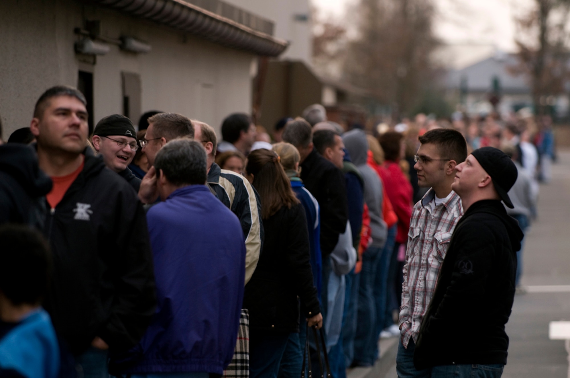 Country music fans from the Kaiserslautern Military Community wait in line two hours prior to see Sugarland perform during a special concert, March 14, 2008, Ramstein Air Base, Germany. Armed Forces, Army and Navy Entertainment groups, hosted the European tour to military bases in Italy, Germany and the Netherlands. (U.S. Air Force photo by Senior Airman Nathan Lipscomb) 