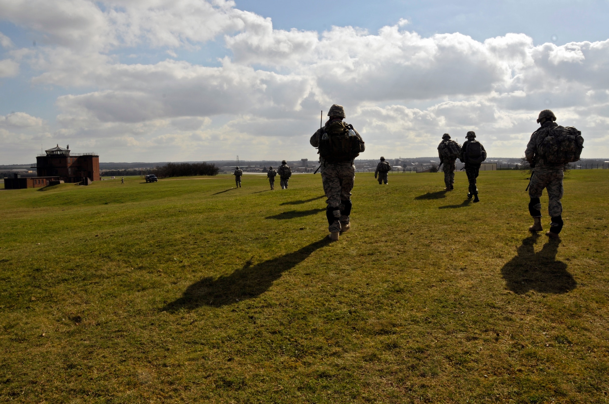 48th Civil Engineer Squadron explosive ordnance disposal team, arrives at their next objective March 6, 2009 at RAF Lakenheath, England. EOD Airmen will have to locate and destroy a simulated enemy weapons cache (U.S. Air Force photo by Airman 1st Class Perry Aston) 