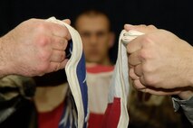 HANSCOM AIR FORCE BASE, Mass. – Honor Guard members practice their flag folding precision during a training session led by members of the U.S. Air Force Honor Guard Mobile Training Team on March 5. The USAF Honor Guard team trained members of the Patriot Honor Guard as well as honor guard members including active duty, guard and reserve from across the New England region from March 2 to 11. The training focused on a variety of honor guard responsibilities including rendering funeral honors and color guard details. (U.S. Air Force photo by Linda LaBonte Britt)