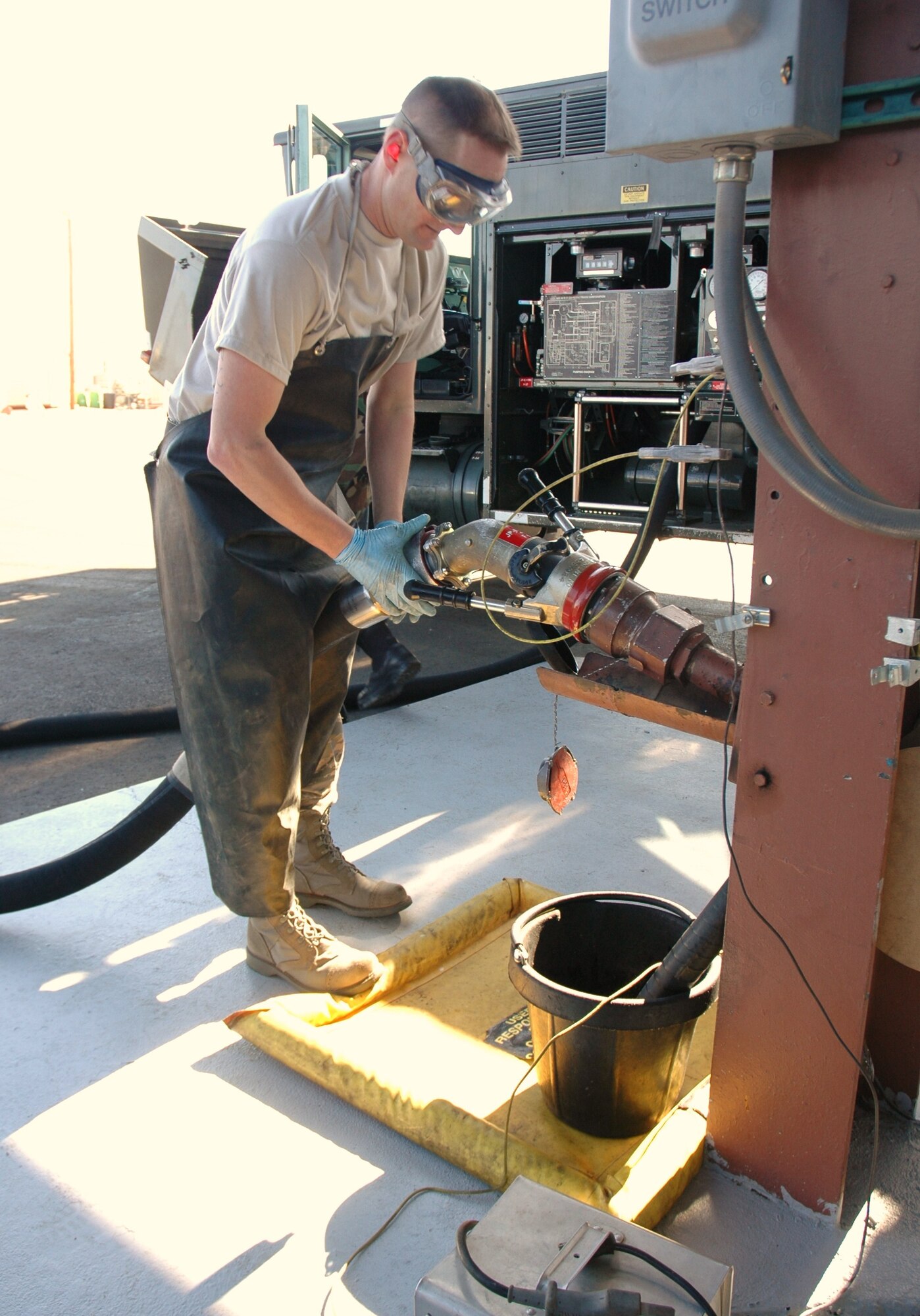 Senior Airman Matthew Fink, 944th Logistics Readiness Squadron fuels distribution specialist, performs a demonstration March 7. The 944th LRS fuels flight is one of two finalists for the Golden Derrick Award. (U.S. Air Force photo/Staff Sgt. Louis Vega)