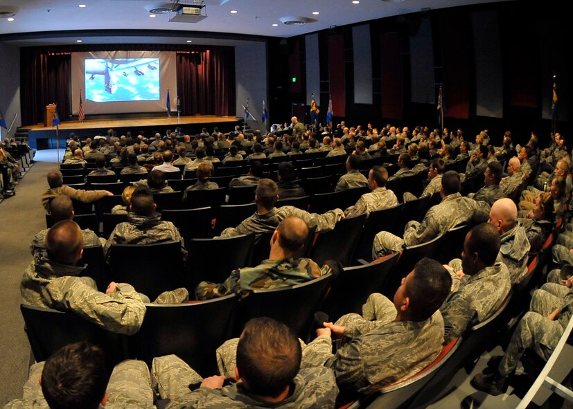 A plethora of squadrons watch a motivating slideshow during a pep rally to prepare for the Operation Readiness Inspection at the base theater on March 13. (U.S. Air Force photo / Airman 1st Class Melissa L. Barnett)