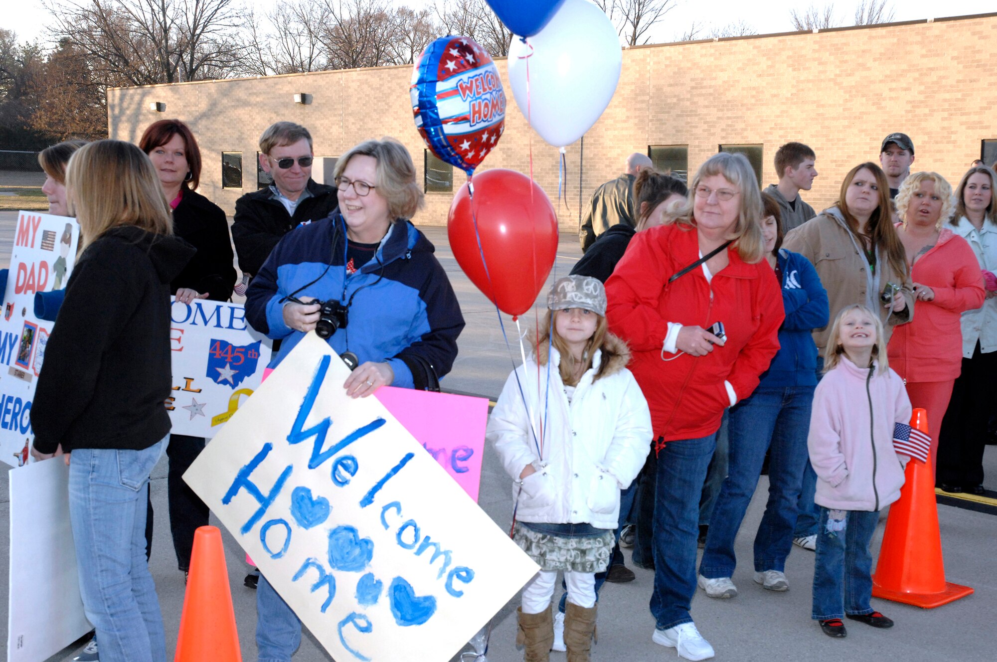 WRIGHT-PATTERSON AFB, Ohio – Sixty Civil Engineer Squadron Airmen are greeted by family and friends after returning from a six month deployment to Southwest Asia.  The Airmen returned to the base Sunday, March 15. (Air Force photo/Al Bright)   