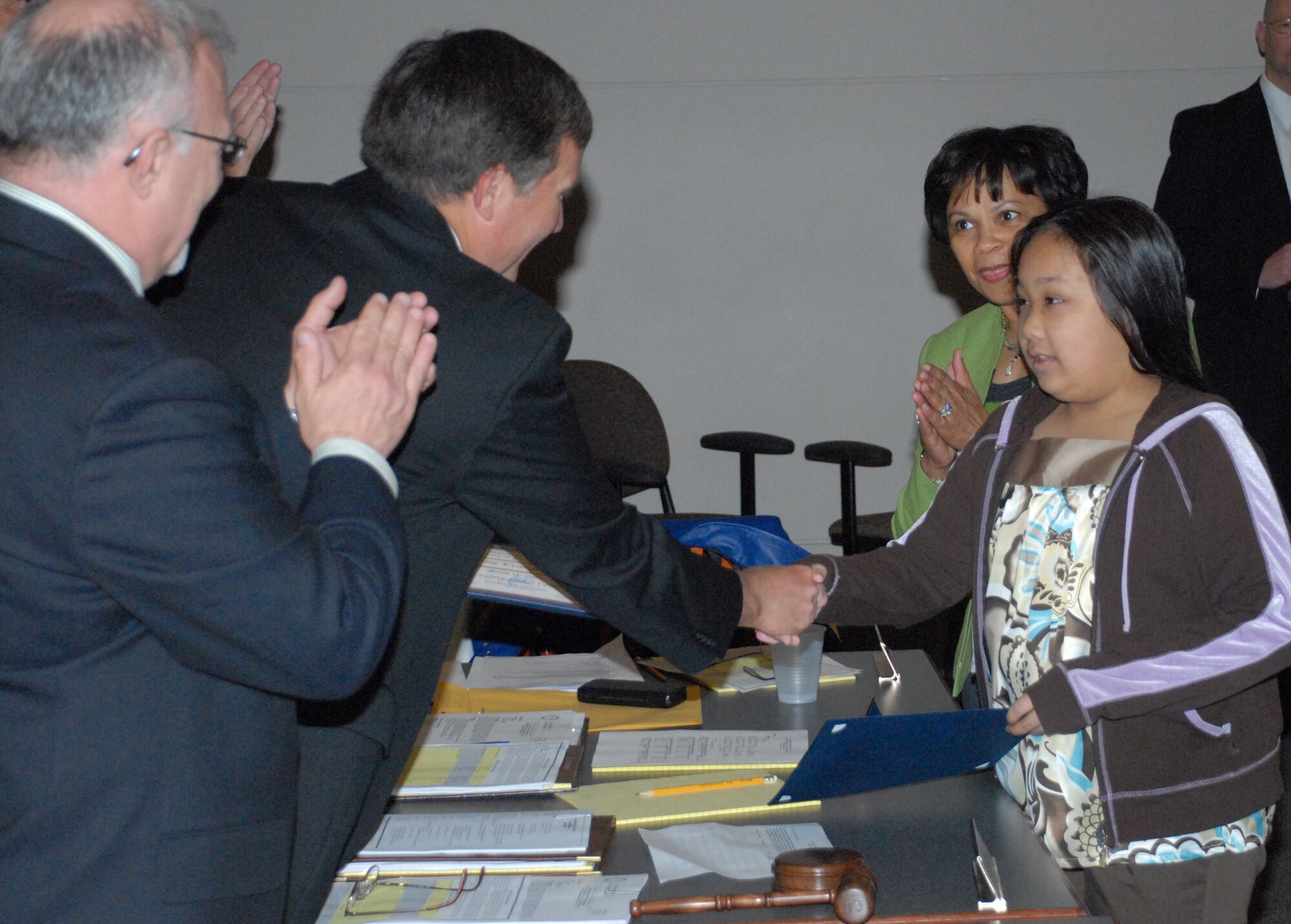 Debbie Evangelista, the daughter of Tech. Sgt. Dennis Evangelista, 436th Force Support Squadron, is recognized March 17 by the Caesar Rodney School District for winning both the Blue Rocks Holiday Card Contest and the School Bus Safety Poster Contest.  (U.S. Air Force photo/Staff Sgt. Chad Padgett)