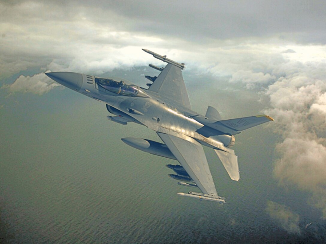 F-16 "Wild Weasel Blues"  Created by Ken Chandler. This image is 10x7.5 @ 72 ppi. PDF files for this image, up to 48x36 inches @ 300 ppi, are available by contacting afgraphics@dma.mil. This image is copyrighted and is the property of Ken Chandler and is available only to members of the armed forces and military organizations. 