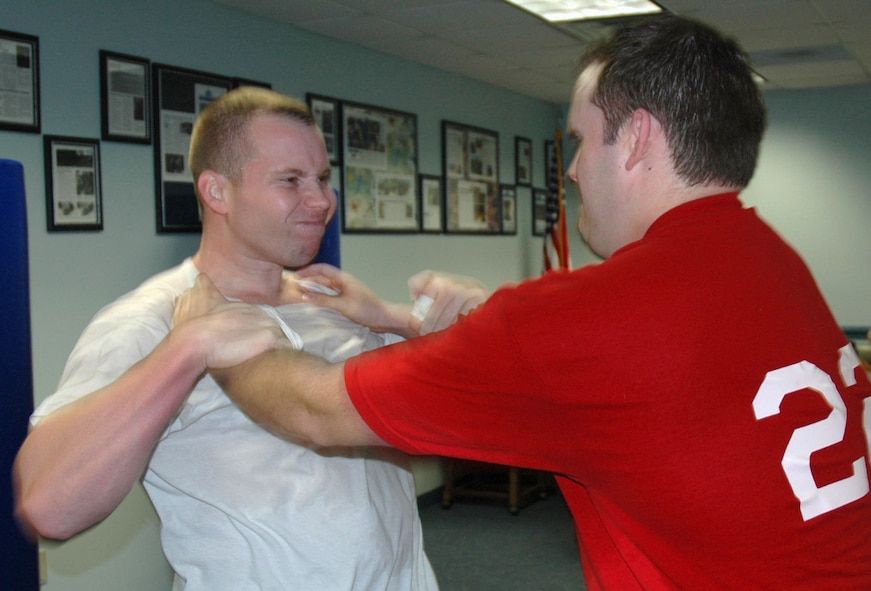 Master Sgt. Jeff Rose (left), 919th Civil Engineer Squadron, practices breaking a choke hold during a Krav Maga training class taught weekly at Duke Field. Krav Maga is a type of close-quarters combat training developed in Israel and used by Israeli Defense Forces as well as several U.S. government and law enforcement agencies. Rigorous training routines help students build greater cardio fitness, muscle strength and coordination, as well as provide strong self defense tactics for real world or combat situations.  (U.S. Air Force photo / Master Sgt. Paul Morales)