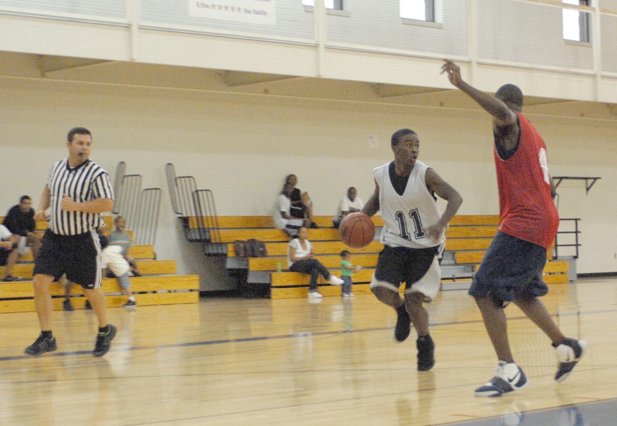 DYESS AIR FORCE BASE, Texas - The MVP of the second game, No. 11 Marcus Godlock scored 12 points in the second half. (U.S. Air Force photo by Staff Sgt. Joel Mease)