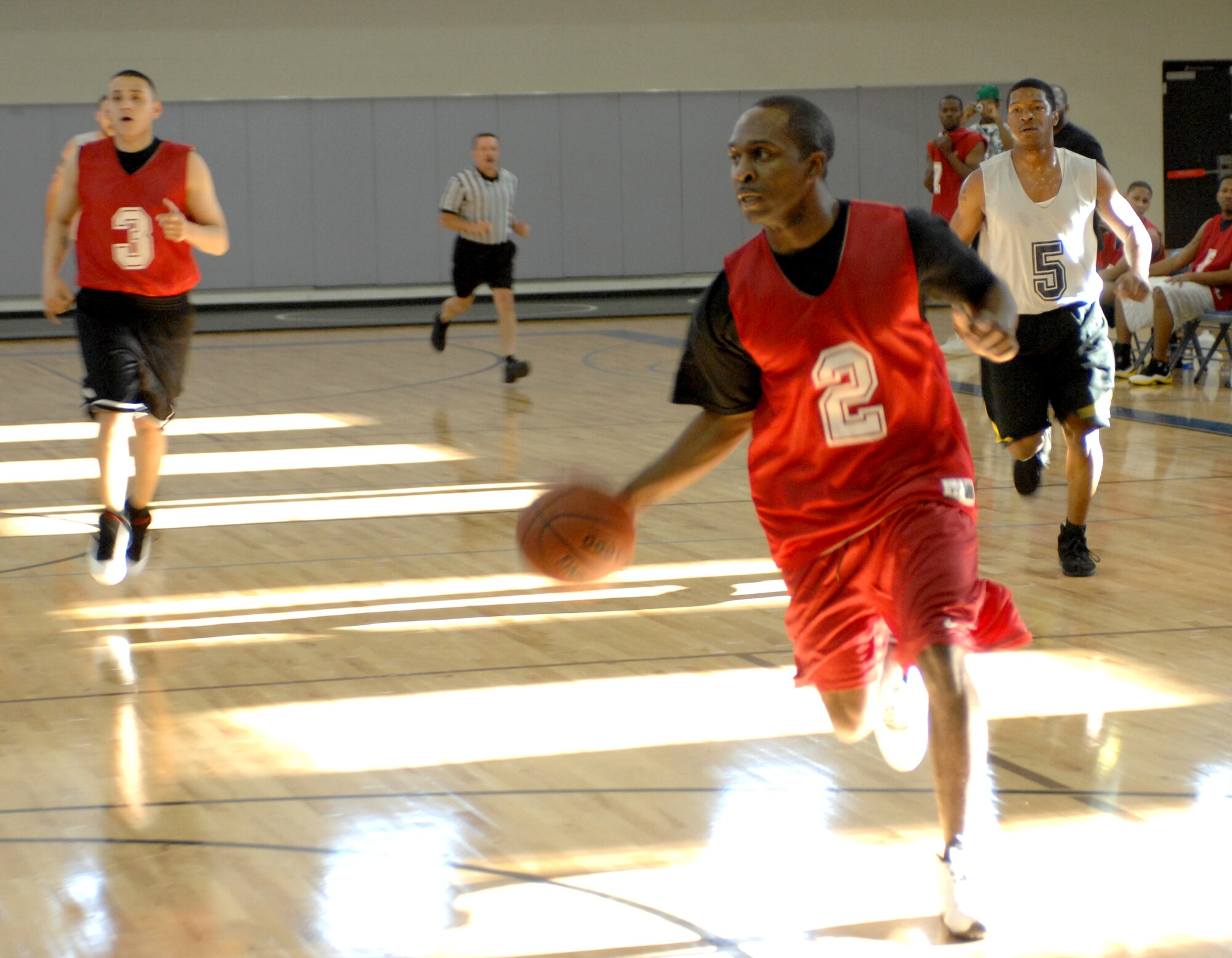DYESS AIR FORCE BASE, Texas - 7th MDG's Hill drives to the basket in the first game of the championship. MDG won the first game 52-50. (U.S. Air Force photo by Staff Sgt. Joel Mease)