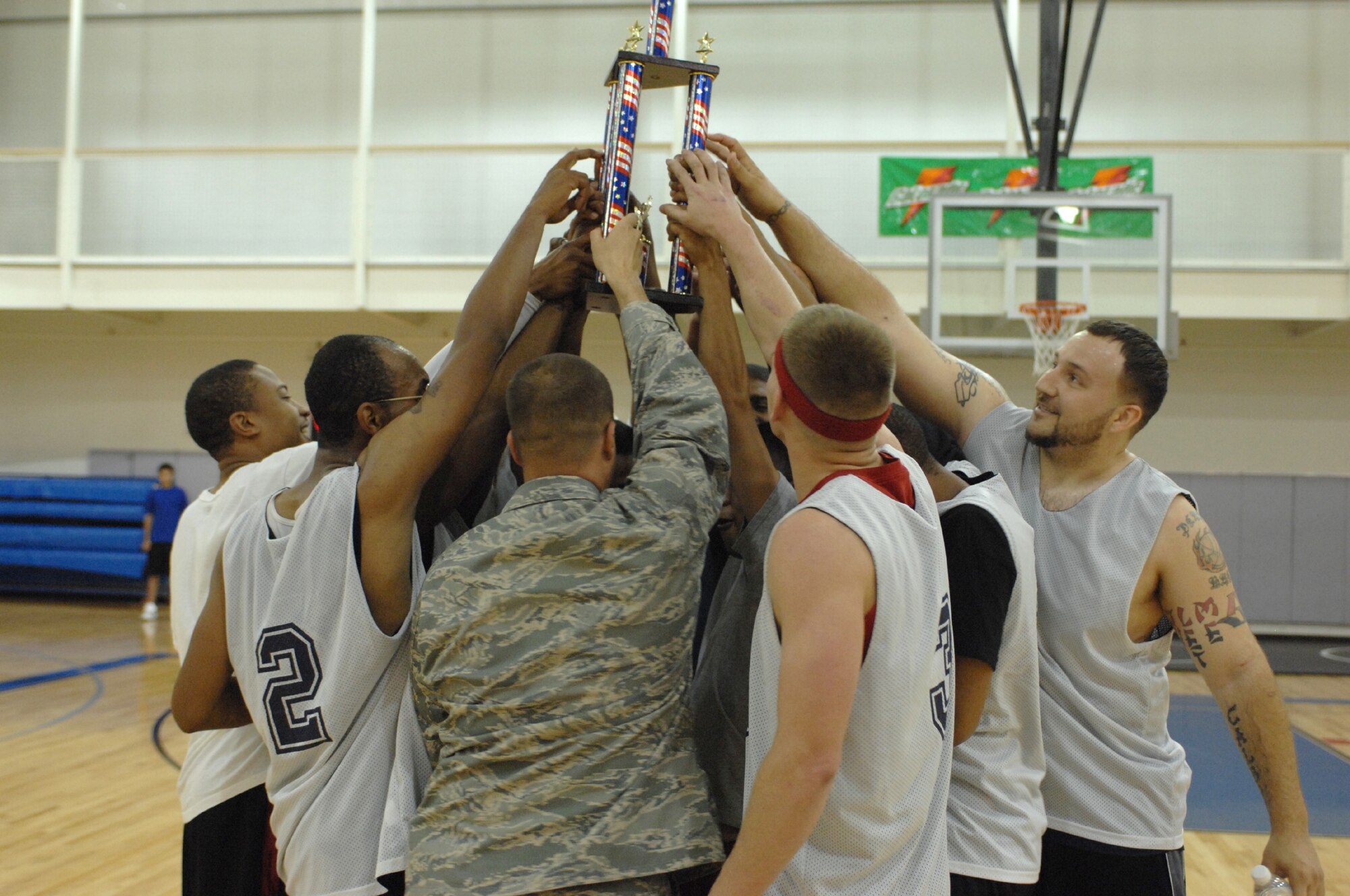 DYESS AIR FORCE BASE, Texas - 7th CMS celebrates winning the base basketball championship March 18. (U.S. Air Force photo by Staff Sgt. Joel Mease)