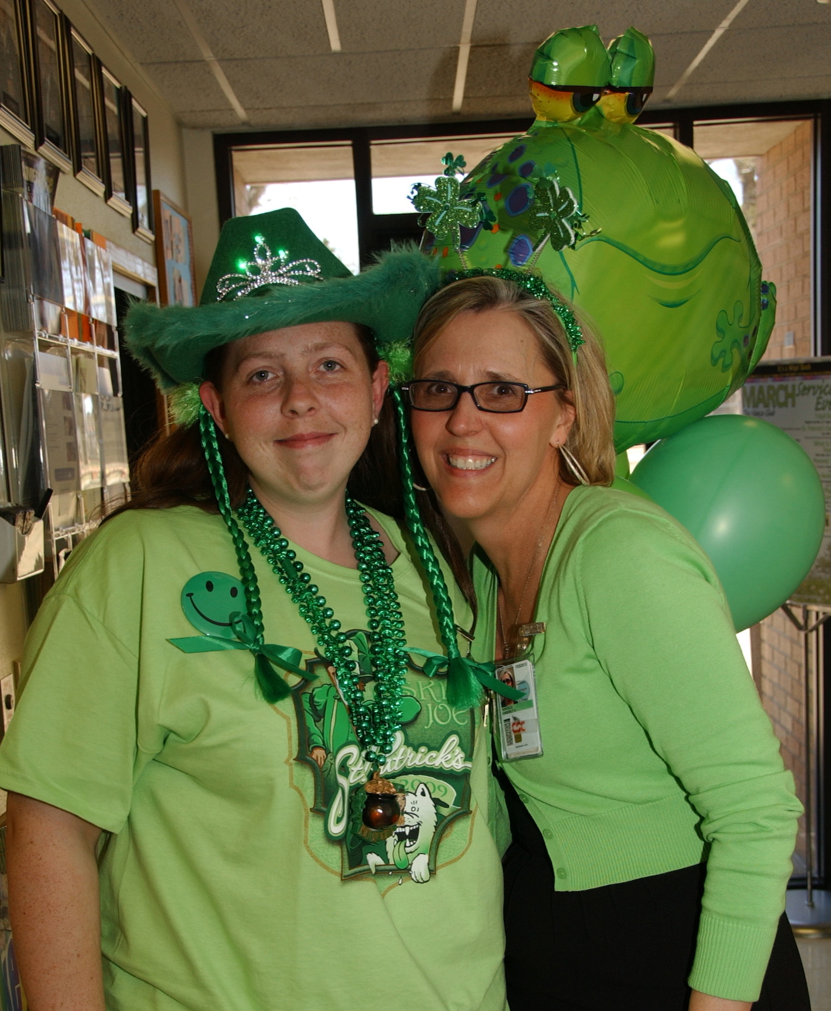 Victoria Broder, left, and Kim Winfield, with the School Age Program at Vance, show their St. Patrick's Day pride March 17. (U.S. Air Force photo by Staff Sgt. Brian Hill)                    
