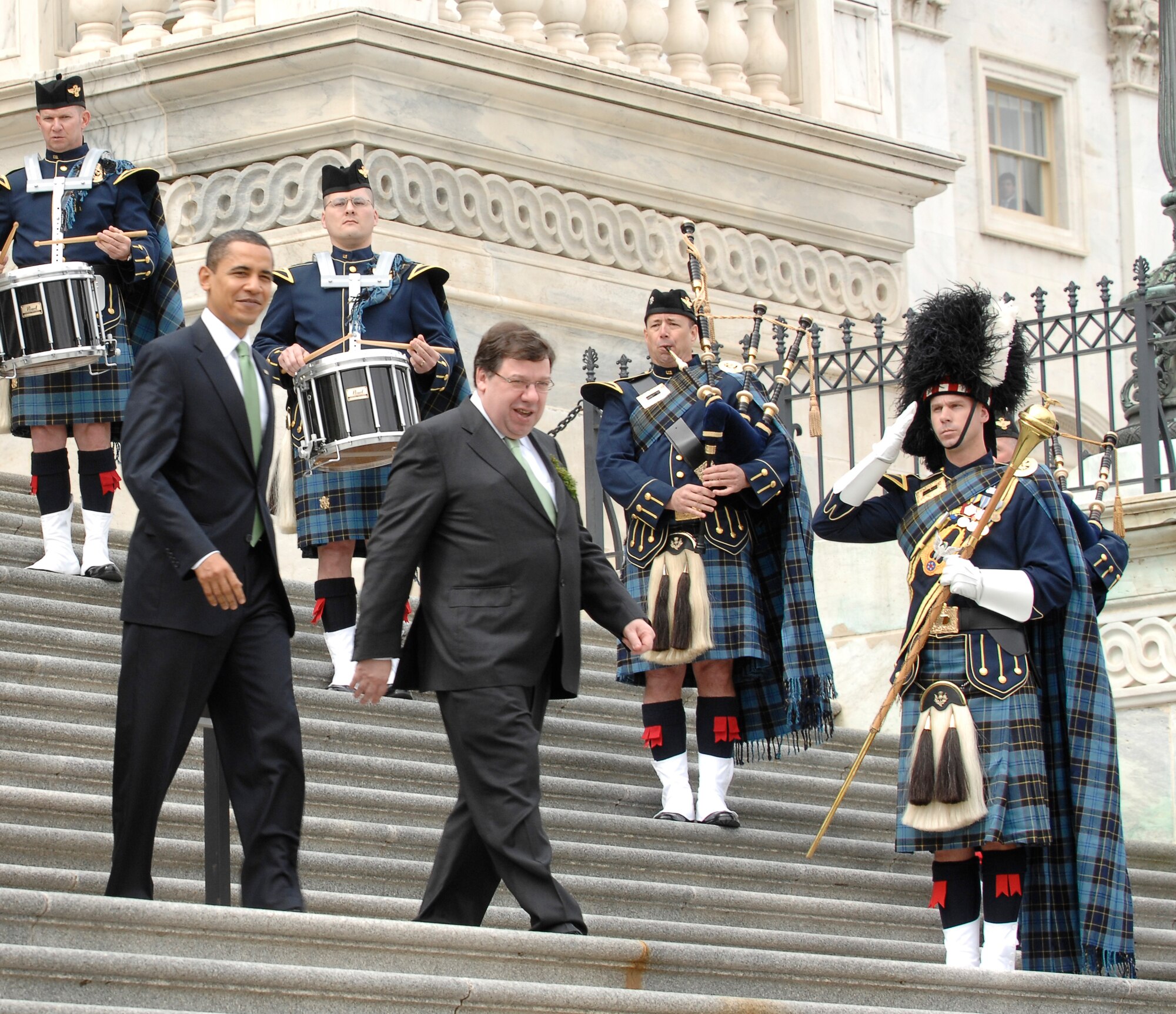 President Barack Obama and Irish Prime Minister Brian Cowen descend from the U.S. Capital March 17, 2009, to the sounds of traditional Irish tunes performed by the U.S. Air Force Reserve Pipe Band. The pipe band has performed for the president and Irish prime minister at this St. Patrick's Day venue since the 1990s. (U.S. Air Force photo/Andy Morataya)