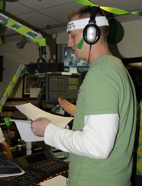 Staff Sgt. Matthew Lichtenberg, American Forces Network Incirlik, tells a joke during a live broadcast for the Air Force Assistance Fund Telethon March 17 at Incirlik Air Base, Turkey.  AFN hosted the telethon and raised more than $5,000.  Donations were made by members of Incirlik to send individuals to the “Jail’n’Bail” or to request songs over the radio to be played.  Song requests were a dollar, while two dollars or more bought a different song to “bump” the original. (U.S. Air Force photo/Airman 1st Class Amber Russell)