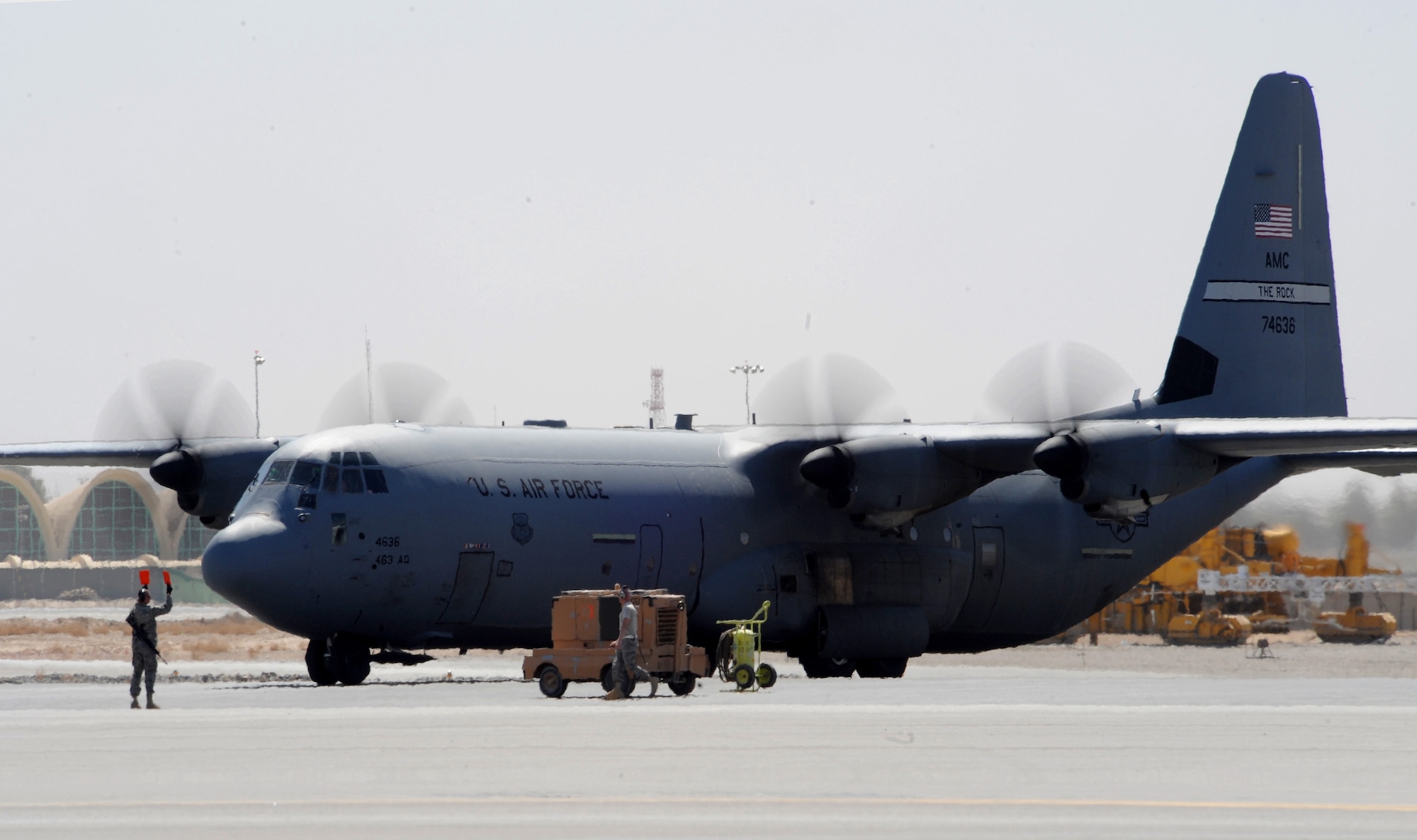 A U.S. Air Force C-130J assigned to the activated 772nd Expeditionary Airlift Squadron, arrives at Kandahar Air Field, Afghanistan, March 14, 2009, in support of Operation Enduring Freedom.The new airlift squadron has been set up at Kandahar Air Field to assist with the increase of U.S. Troops to the region.  (U.S. Air Force photo by Staff Sgt. James L. Harper Jr.)