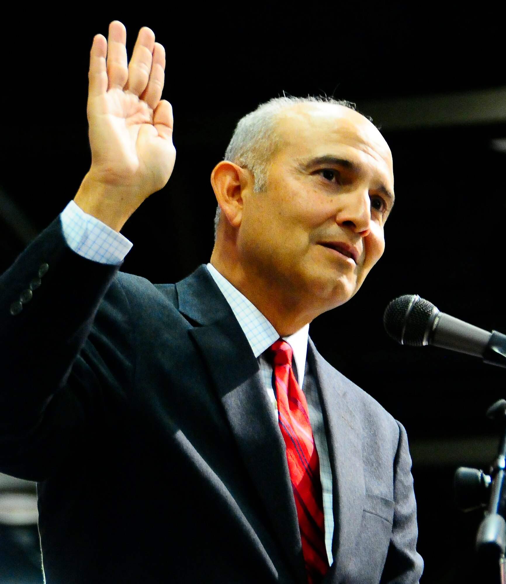 The Honorable Philip R. Martinez, U.S. district judge, administers the oath of citizenship to over 1,000 applicants at the El Paso Convention Center March 11. Within the group were two members of Team Holloman. (U.S.Air Force Photo/Tsgt Chris Flahive)