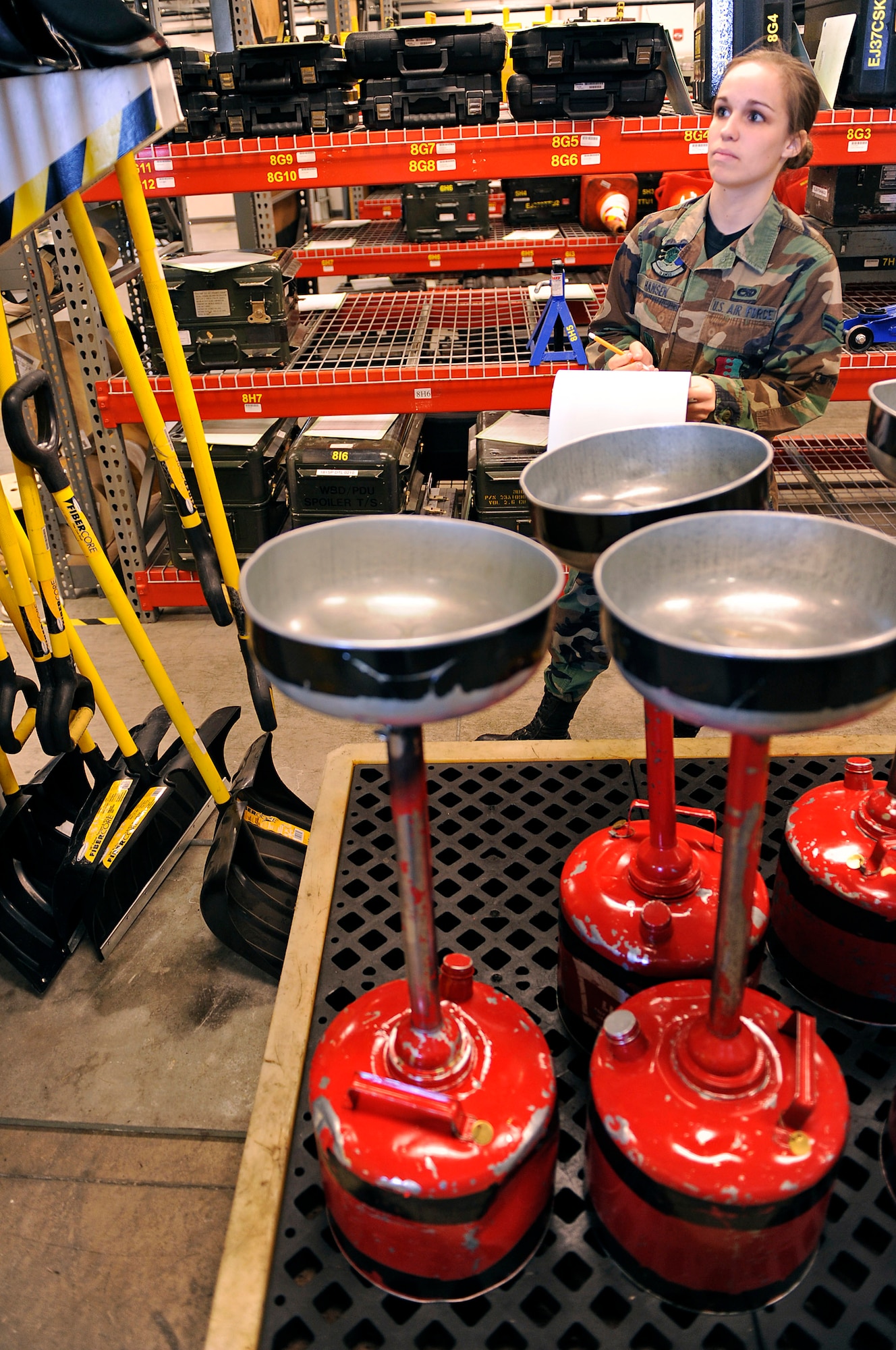 Airman 1st Class Faith Hansen, 28th Aircraft Maintenance Squadron composite tool kit support technician, performs an inventory of tool kits during a shift change at the composite tool kit facility, March 16. The 28 AMXS composite tool kit section houses more than 5,000 tools and tool kits. (U.S. Air Force photo/Senior Airman Marc I. Lane)