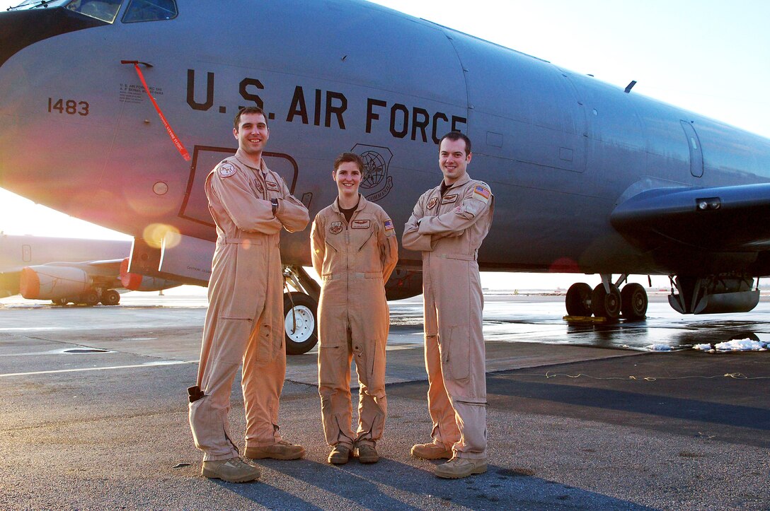 Capt. Matthew Jaeger, Senior Airman Mckayla Dick and 1st Lt. Vance Feavel stand before the KC-135 Stratotanker they safely landed using Global Positioning Systems and support from a nearby C-17 Globemaster III when the navigation systems failed during a refueling sortie March 16 from Manas Air Base, Kyrgyzstan. The crew is deployed from the 92nd Air Refueling Squadron at Fairchild Air Force Base, Wash. The pilot, Captain Jaeger, is originally from Croton, Ohio. Co-pilot Lieutenant Feavel is a native of North Pole, Alaska. Airman Dick, the boom operator, is originally from El Paso, Texas. (U.S. Air Force photo/Tech. Sgt. Phyllis Hanson) 