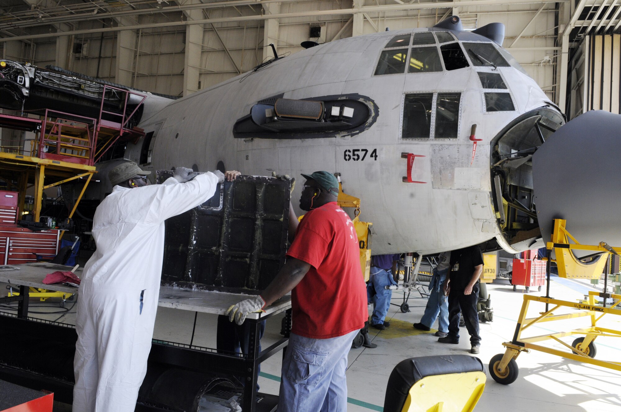 Robins workers found cracks in barrel nuts in C-130 aircraft like this one, causing the flying of the aircraft to be halted while the entire C-130 fleet was examined.
U.S. Air Force photo by Sue Sapp