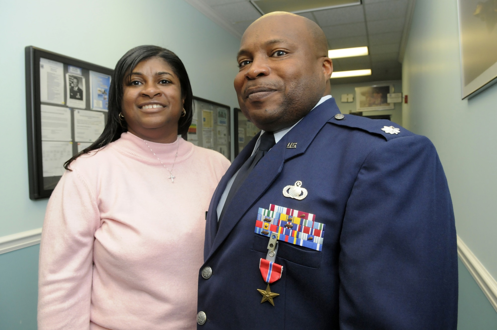 Lt. Col. James Boles and his wife Amy pose for a picture after he received his Bronze Star Medal March 13. U. S. Air Force photo by Sue Sapp