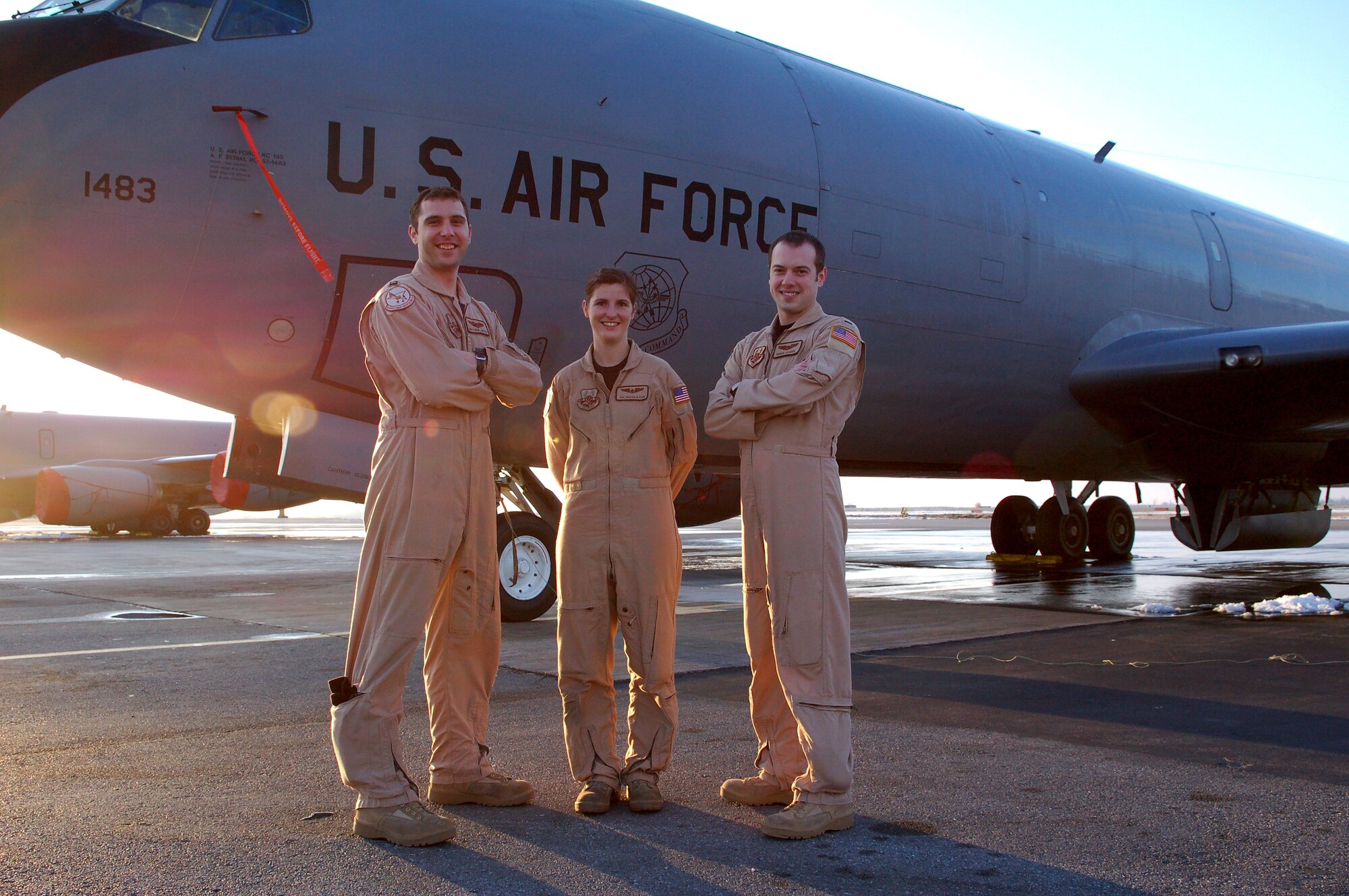 Capt. Matthew Jaeger, Senior Mckayla Dick and 1st Lt. Vance Feavel stand before the KC-135 Stratotanker, March 19, that they safely landed using GPS when the navigation system failed during a refueling sortie from Manas Air Base, Kyrgyzstan. The crew is deployed from the 92nd Air Refueling Squadron at Fairchild Air Force Base, Wash. The pilot, Captain Jaeger is originally from Croton, Ohio. Co-pilot Lieutenant Feavel is a native of North Pole, Alaska. Airman Dick, the boom operator, is originally from El Paso, Texas. (U.S. Air Force photo/Tech. Sgt. Phyllis Hanson)