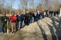 HANSCOM AIR FORCE BASE, Mass. -- Electronic Systems Center’s annual award nominees gather at the Old North Bridge in Concord, Mass., March 17, as part of a comprehensive local-area ‘Awards Week’ tour.  The nominees will be heralded, and winners will be announced, during a banquet to be held in their honor March 19 at Hanscom’s Minuteman Club.  (USAF Photo by: Rick Berry)
