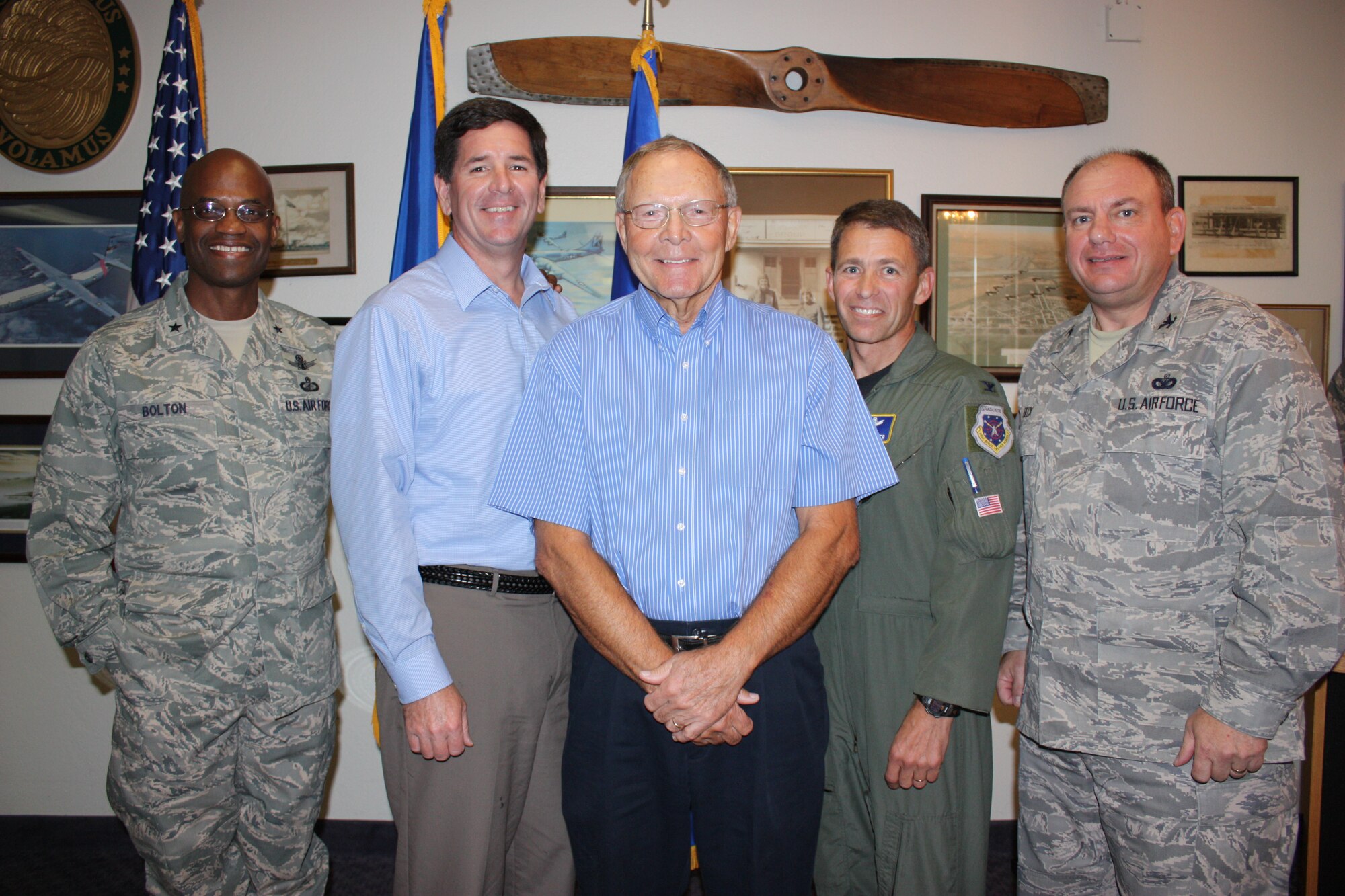 Jerry McAnulty (center) with (left to right) 45th Space Wing Commander Brig. Gen. Edward L. Bolton Jr., Col. (ret.) Thomas Bouthiller, 45th SW Vice Commander Stephen Butler and 45th Mission Support Group Commander Col. Charles Beck at Mr. McAnulty's retirement as head of Patrick Air Force Base's branch of Project Emeritus March 12 at The Tides. (U.S. Air Force photo/Airman 1st Class David Dobrydney)