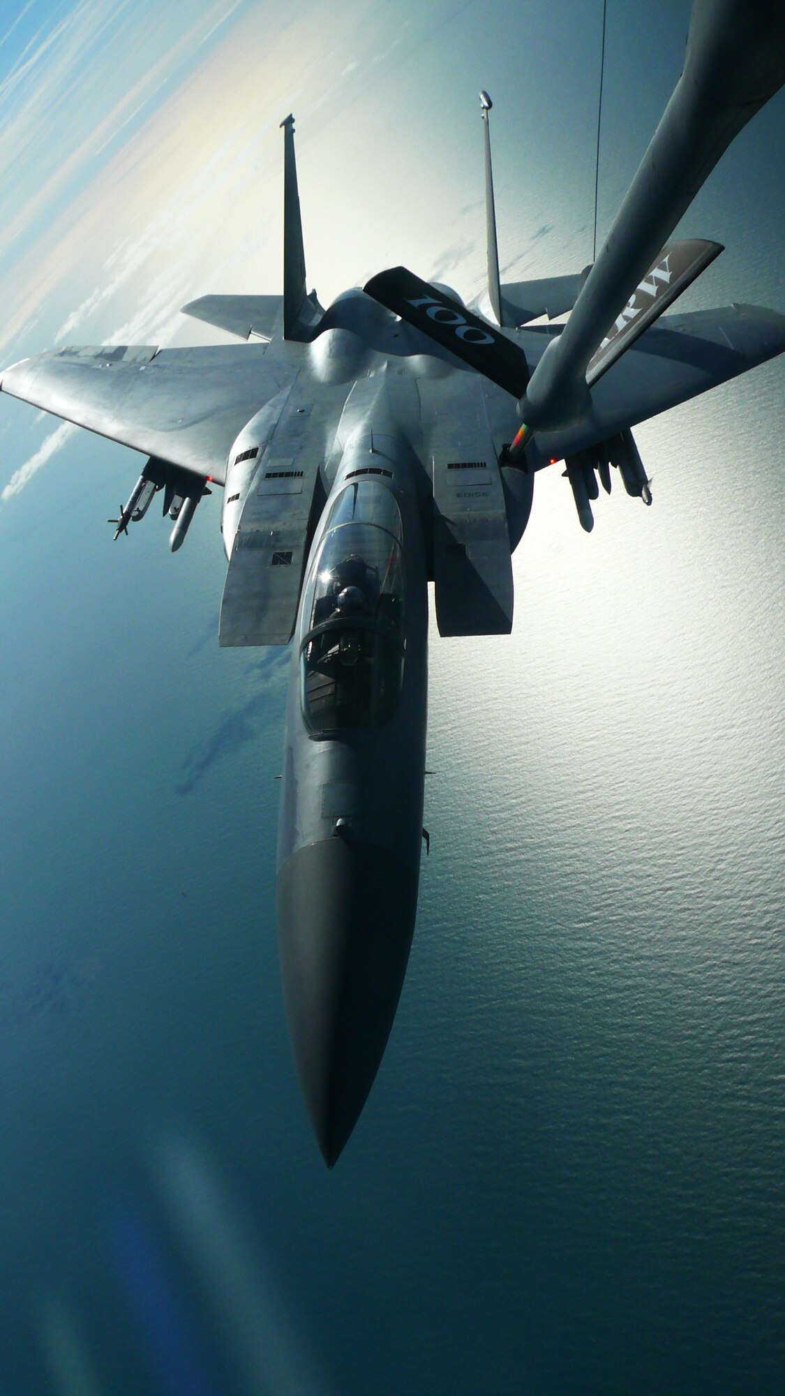A pilot in an F-15 Eagle, assigned to the 48th Fighter Wing at RAF Lakenheath, recieves fuel from a 100th Air Refueling Wing KC-135 Stratotanker from RAF Mildenhall during a standard refueling mission March 18, 2009. (Photo by David Ellis) 