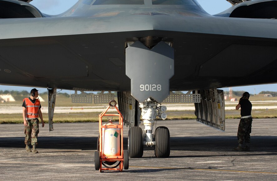 (left) Airman 1st Class?s Joshua Silva and Aaron Goodloe prepare to launch a B-2 Spirit from the 509th Bomb Wing, 13th Bomb Squadron Whiteman Air Force Base, Mo., March 13, during a Polar Lightning exercise originating at Andersen Air Force Base, Guam. The Polar Lightning missions are flown to showcase the global reach and power of the U.S. bomber force and at the same time the sorties give aircrews an incredible opportunity to hone their skills. The long-range, strategic bombers are part of the continuous rotating bomber presence deployed to Andersen. The bomber rotation is aimed at enhancing regional security, demonstrating U.S. commitment to the Pacific region. The Air Force will continue to rotate bombers and fighters on a regular basis to ensure regional stability. Both Airmen are deployed and assigned to 36th Expeditionary Maintenance Squadron. (U.S. Air Force photo/ Master Sgt. Kevin J. Gruenwald) released   