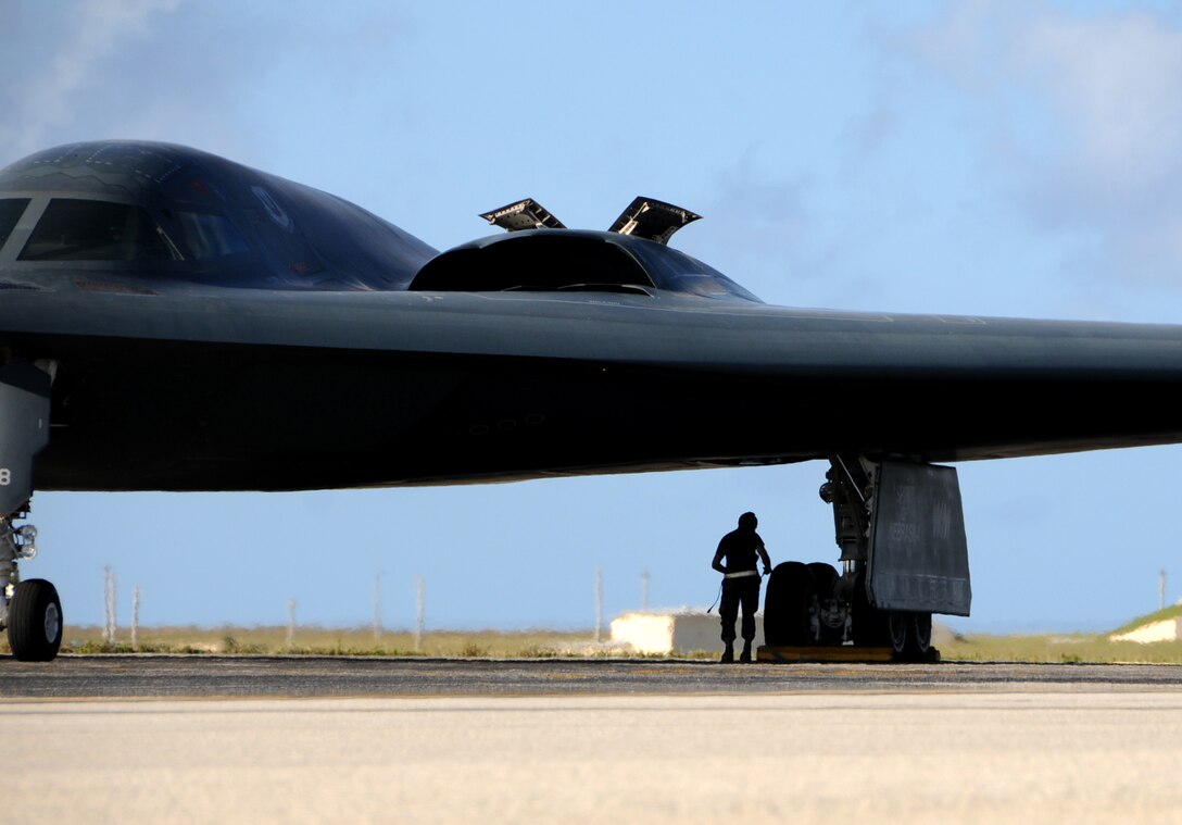 Airman 1st Class Aaron Goodloe, 36th Expeditionary Maintenance Squadron crew chief, prepares to launch a B-2 Spirit after an engine running crew swap March 12 during exercise Polar Lightning.  Polar Lightning, flown out of Andersen Air Force Base,Guam, was designed to provide Bomber pilots experience in long duration missions.  B-2 Spirits are deployed here from Whiteman AFB, Mo. as part of a regularly scheduled Air Expeditionary Force rotation to the pacific.(U.S. Air Force photo by Senior Airman Ryan Whitney)