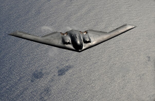 A B-2 Spirit from the 509th Bomb Wing, 13th Bomb Squadron Whiteman Air Force Base, Mo., flies over the Pacific Ocean during a mission exercise. The long-range, strategic bombers are part of the continuous rotating bomber presence deployed to Andersen Air Force Base, Guam. The rotating bomber units promote security and stability in the region as well as provide unique aircrew training opportunities.

(U.S. Air Force photo/ Master Sgt. Kevin J. Gruenwald) released
























  












 











































  












 

























