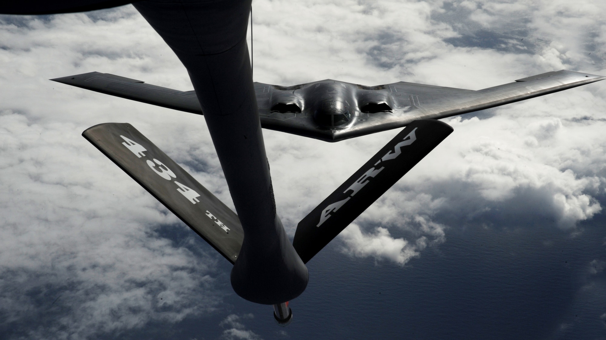 A B-2 Spirit from the 509th Bomb Wing, 13th Bomb Squadron Whiteman Air Force Base, Mo., positions to refuel from a KC-135 Stratotanker over the Pacific Ocean March 10. More than 270 Airmen and four B-2 Spirits are deployed to Andersen as part of a Continuous Bomber Presence in the region. Pacific theater refueling operations are being conducted by 434th Air Refueling Wing, Grissom Air Reserve Base, Ind.

(U.S. Air Force photo/ Master Sgt. Kevin J. Gruenwald) released

























  












 











































  












 

























