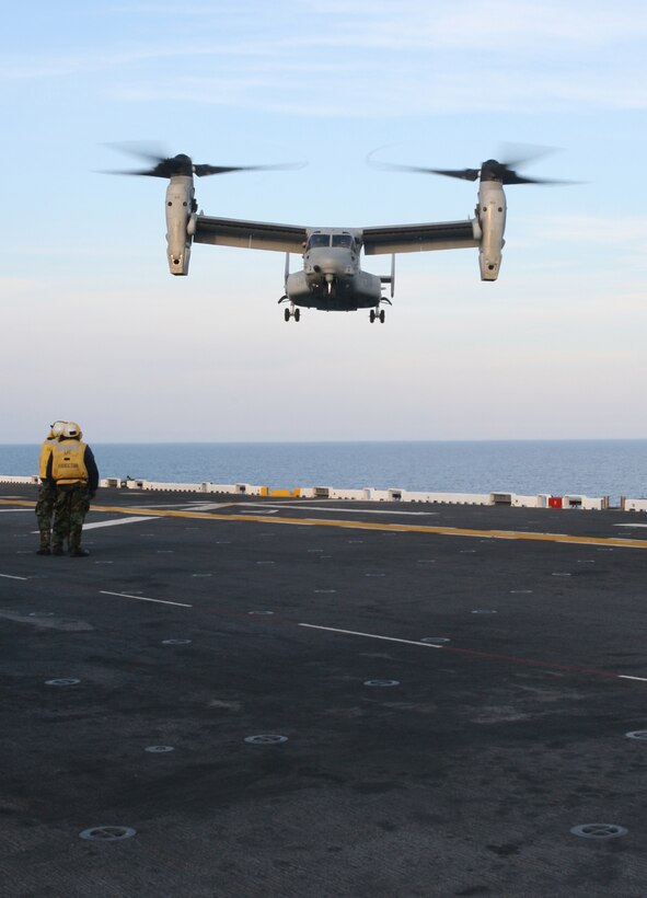 An MV-22B Osprey lands on the flight deck of USS Bataan during flight operations, Mar. 19, 2009, as part of the 22nd Marine Expeditionary Unit's Certification Exercise. CERTEX is the last training hurdle before the MEU's upcoming deployment this spring. (Official Marine Corps photo by Cpl. Justin M. Martinez)