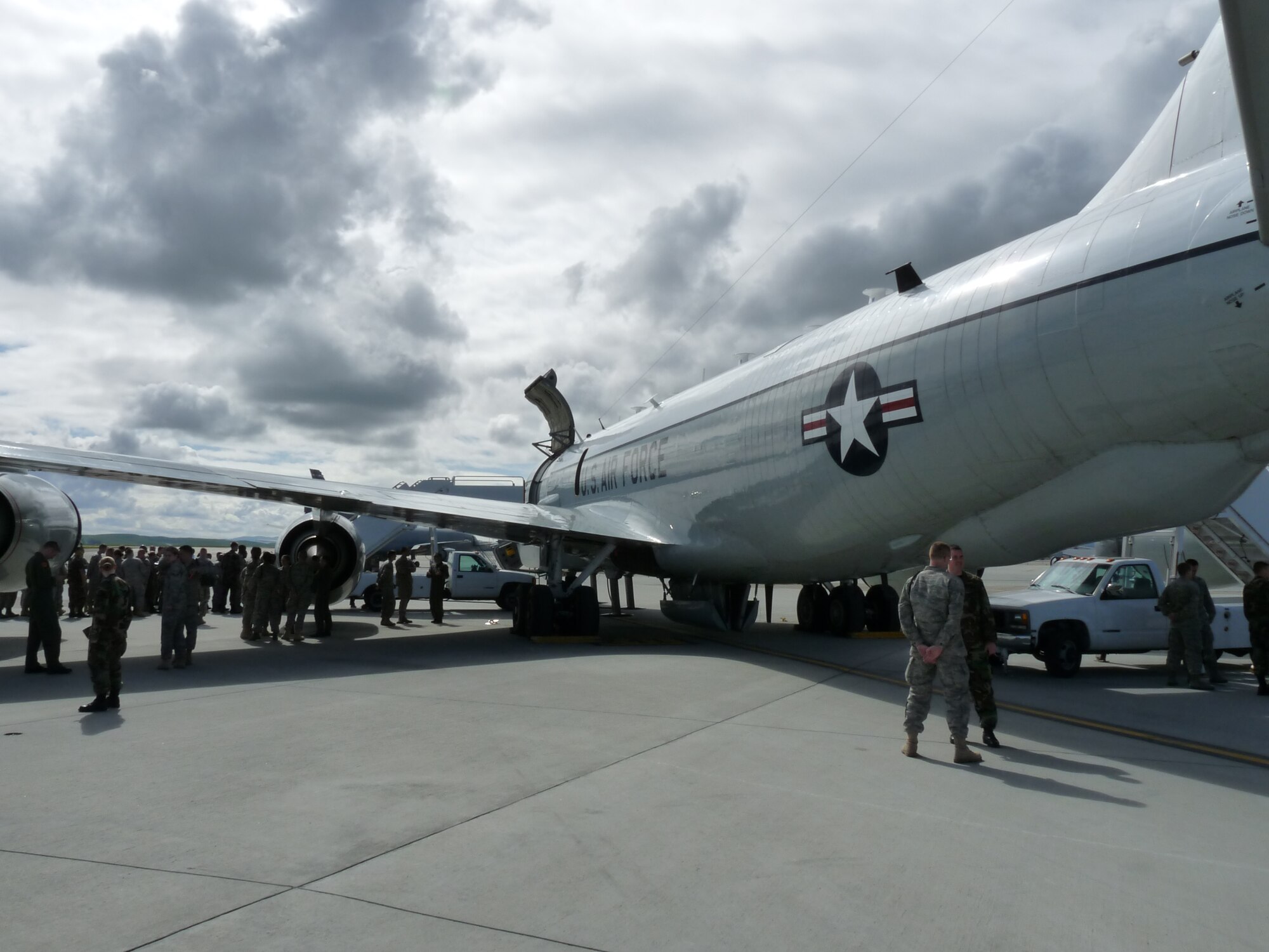 Airmen from the 311th and 314th Training Squadrons at the Presidio of Monterey, Calif., pose in front of an RC-135 V/W RIVET JOINT aircraft at Travis Air Force Base, Calif. (U.S. Air Force photo by Airman 1st Class Thomas Coyle)