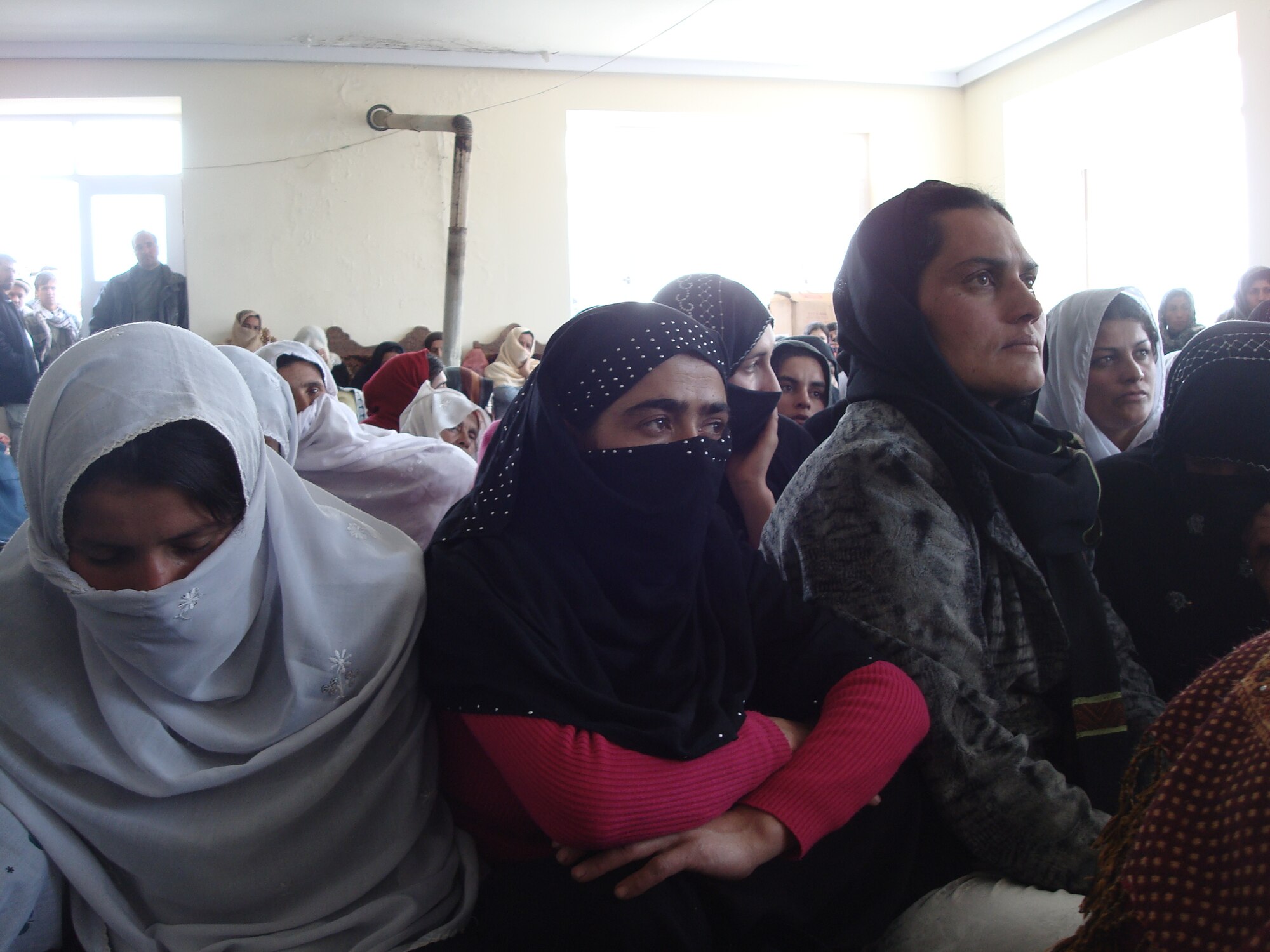 BAGRAM AIR FIELD, Afghanistan--Nearly 125 women and girls listen to the guest speakers during Panjshir’s International Women’s Day celebration March 8 at the Astana Guesthouse in Bazarak District. (U.S. Air Force photo by Capt. Stacie N. Shafran)